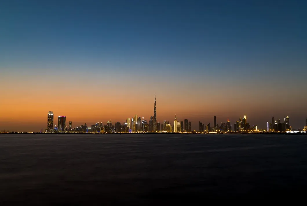 UAE skyline at dusk with the Sheikh Zayed Grand Mosque